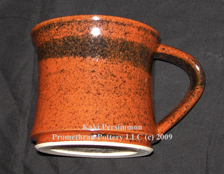 Notice how the density of black flecks increases with increasing thickness of the glaze.